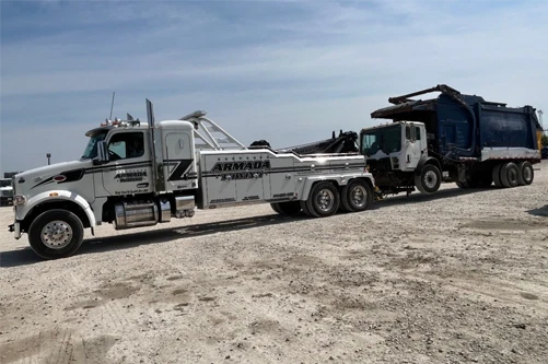 Armada Towing Service heavy-duty towing commercial garbage truck