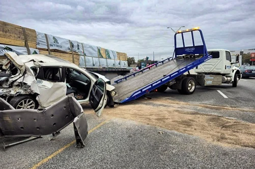 Armada Towing Service roadside assistance recovering damaged SUV