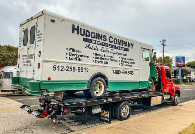 Armada Towing Service rollback tow truck towing commercial box truck