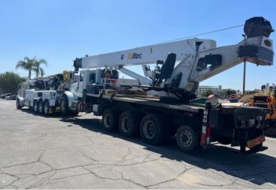 Armada Towing Service heavy-duty wrecker towing mobile crane truck