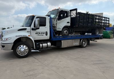 Armada Towing Service commercial vehicle support with rollback truck