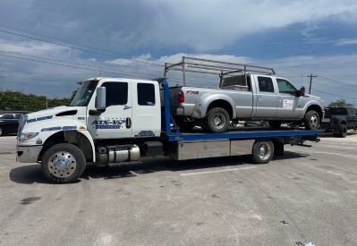 Armada Towing Service local vehicle towing pickup on flatbed