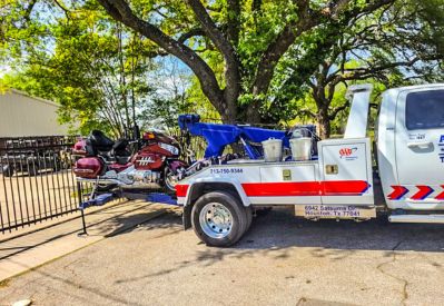 Armada Towing Service motorcycle towing with tow truck wrecker