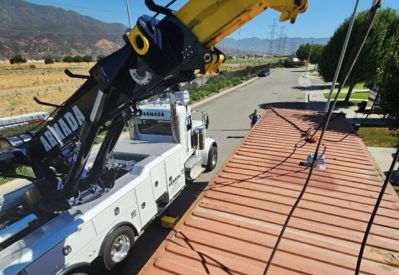 Armada Towing Service rotator using multi-point rigging for recovery