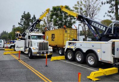 Armada Towing Service tandem rotators performing heavy lift