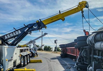 Armada Towing Service rotator uprighting overturned commercial semi-trailer